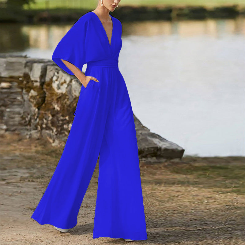 Rebecca – Klänning Jumpsuit med Djup V-hals och Hög Midja
