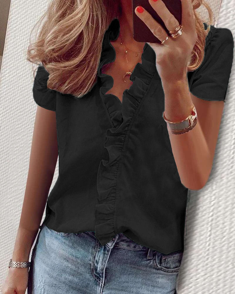 Danielle – Långärmad Blus med Volanger