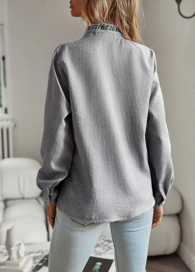 Damblus med volangkant – Elegant och mångsidig vardagsblus för kvinnor