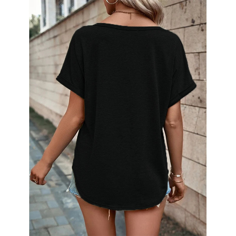 Barbara – V-ringad kortärmad blus med knappdesign