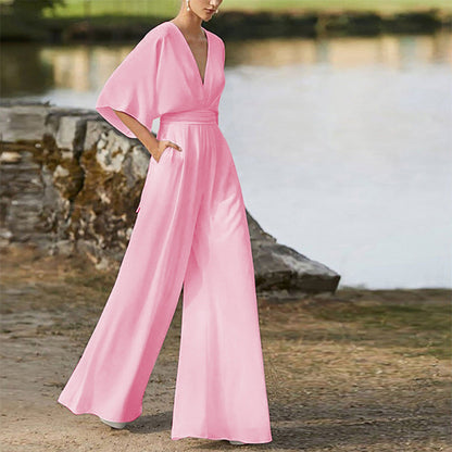 Rebecca – Klänning Jumpsuit med Djup V-hals och Hög Midja