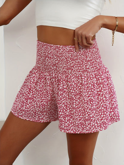 Damshorts med Blommigt Mönster och Smockad Midja – Trendiga Sommarshorts för Fritid och Semester