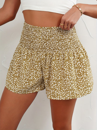 Damshorts med Blommigt Mönster och Smockad Midja – Trendiga Sommarshorts för Fritid och Semester