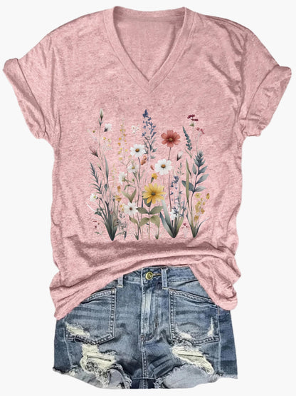 Dam T-shirt med v-ringning och blommönster – avslappnad sommarstil