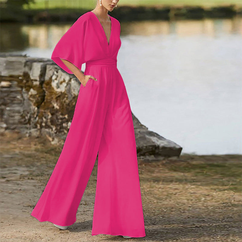 Rebecca – Klänning Jumpsuit med Djup V-hals och Hög Midja