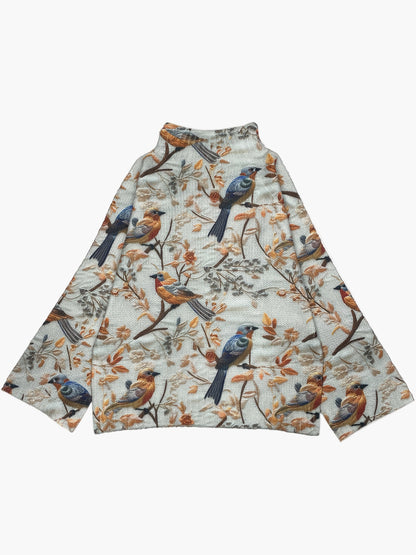 Damstickad tröja med fågelmotiv och hög krage – elegant vardagsmode