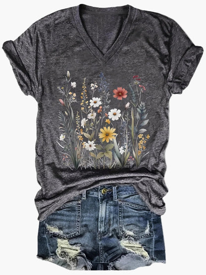 Dam T-shirt med v-ringning och blommönster – avslappnad sommarstil
