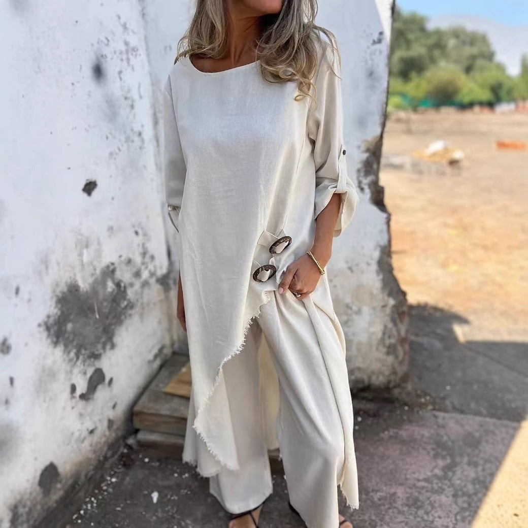 Imogen – Lång kostym med metallknappdesign och rund hals, långärmad topp och raka byxor