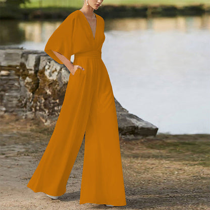 Rebecca – Klänning Jumpsuit med Djup V-hals och Hög Midja