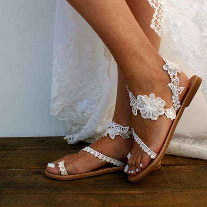 Laura – Romerska Sandaler med Blommor och Ankelrem