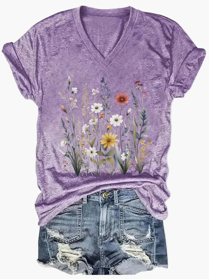 Dam T-shirt med v-ringning och blommönster – avslappnad sommarstil