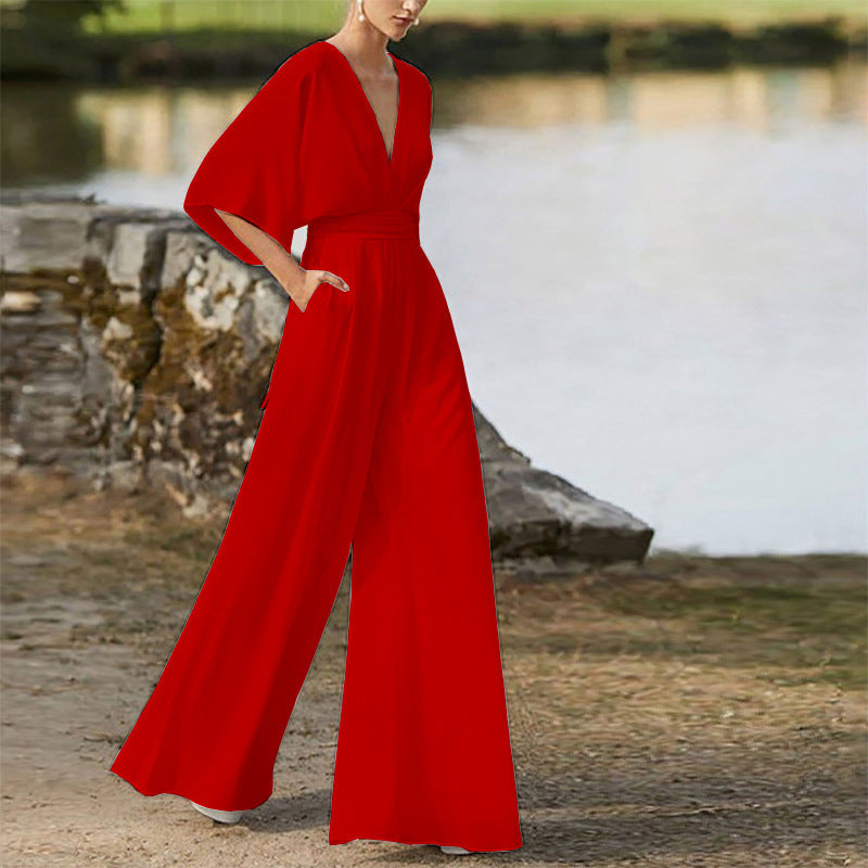 Rebecca – Klänning Jumpsuit med Djup V-hals och Hög Midja