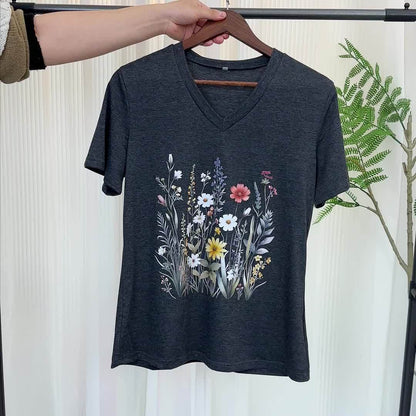 Dam T-shirt med v-ringning och blommönster – avslappnad sommarstil