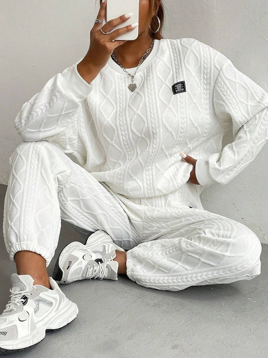 Stella - Stickad tracksuit i kabelmönster